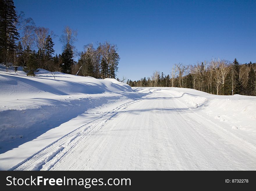 Snow covered  road in winter.