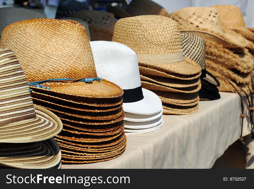 Collection of straw hats for sale. Collection of straw hats for sale