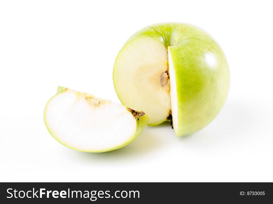 Green apple sliced and isolated on white