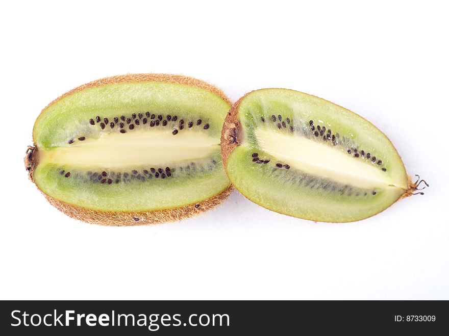 Sliced ripe fresh kiwi isolated on white. Sliced ripe fresh kiwi isolated on white