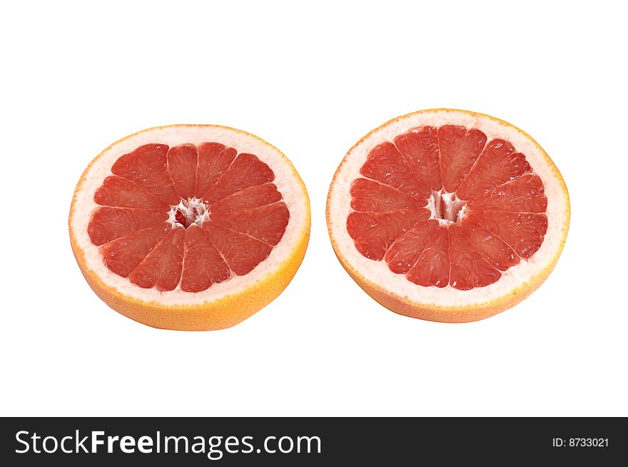 Juicy,tasty pieces of grapefruit isolated on a white background. Juicy,tasty pieces of grapefruit isolated on a white background.