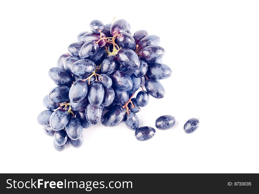 Black ripe fresh grape isolated on white. Black ripe fresh grape isolated on white