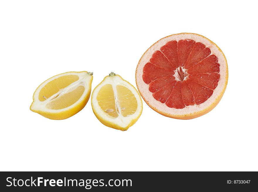 Ripe lemon and grapefruit on a white.