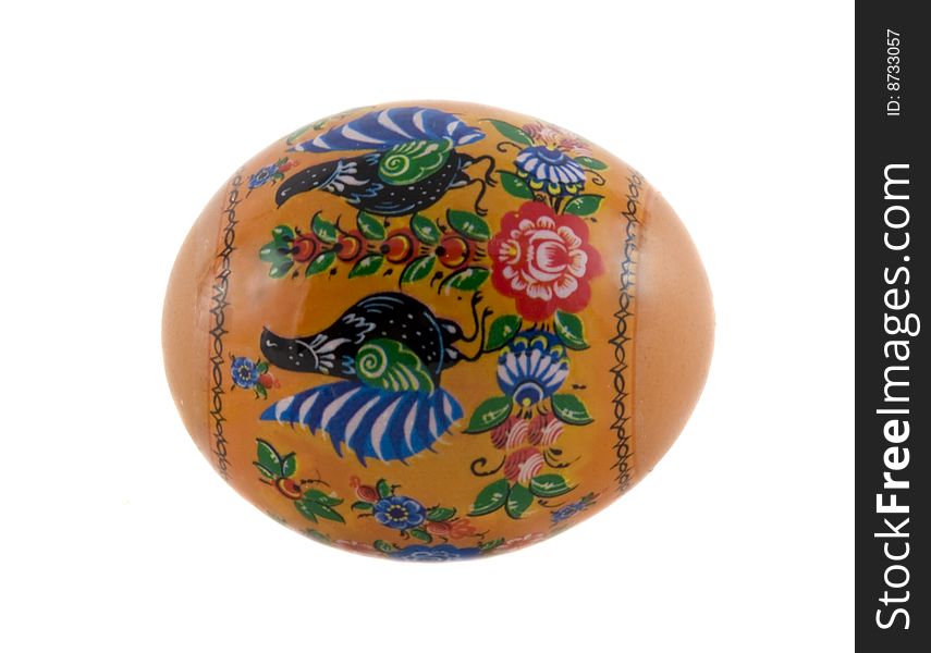 Easter painted egg covered by lacquer and ornamented by miniature painting which is origin from the Russian art. Isolated over white background