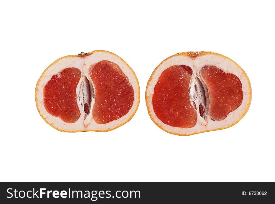 Two pieces of juicy grapefruit isolated on a white background. Two pieces of juicy grapefruit isolated on a white background.