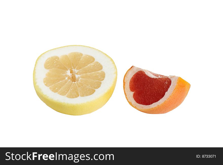 Pieces Of Grapefruit On A White.