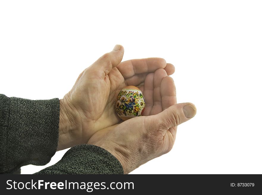 Man hands hold decorated easter egg isolated over white background