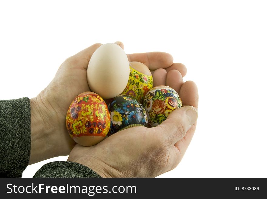 Man hands hold decorated easter eggs isolated over white background. Man hands hold decorated easter eggs isolated over white background