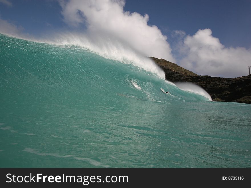 A beautiful wave with scenic background. A beautiful wave with scenic background