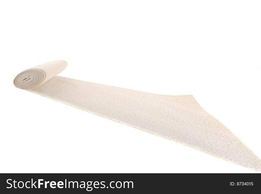 Bundled medical bandage on a white background