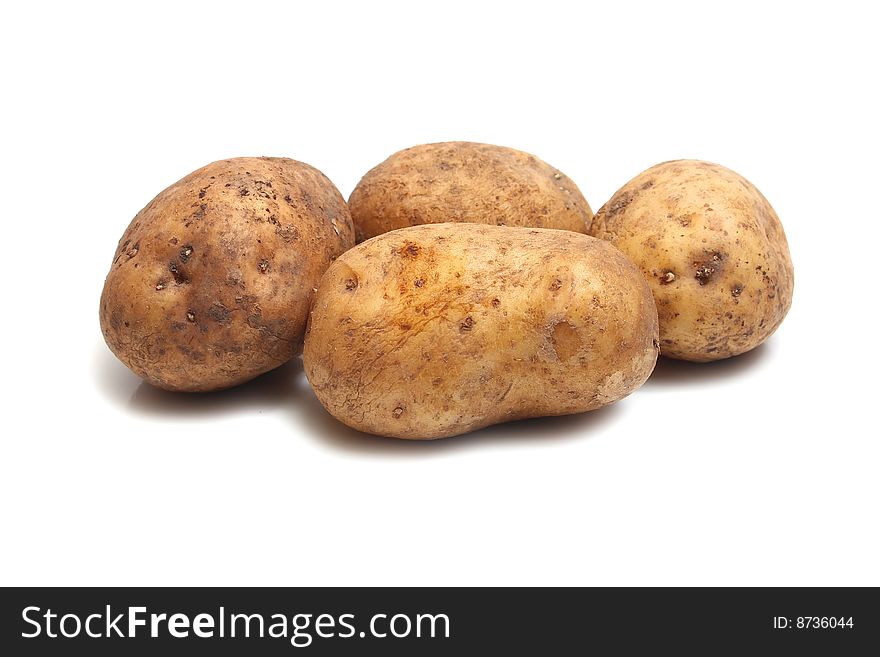 Raw brown potato  isolated on white background