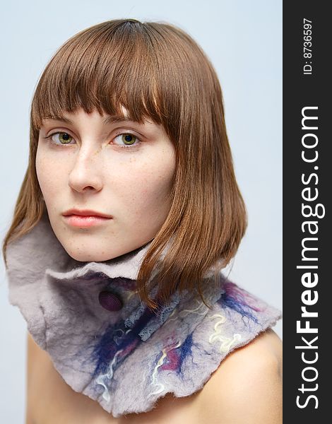Calm Girl With Freckles In Woolen Collar