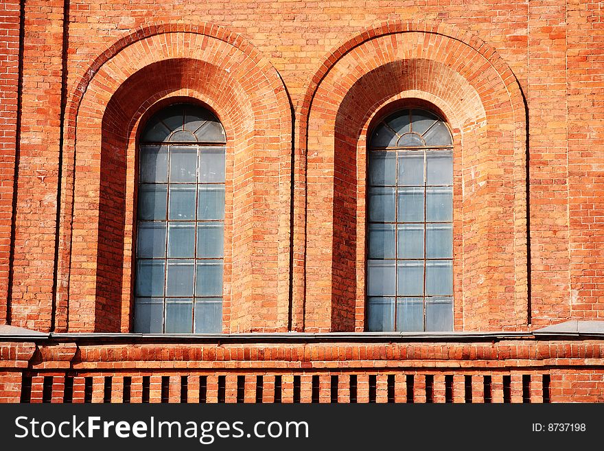Windows in red brick fortress wall. Windows in red brick fortress wall