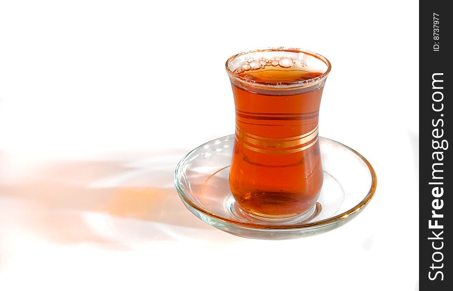Turkish tea in glass on a light background