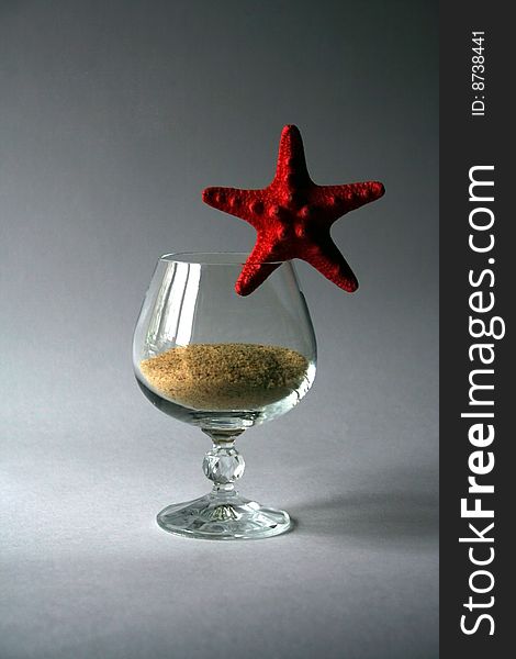 Sand in goblet with starfish. Sand in goblet with starfish.