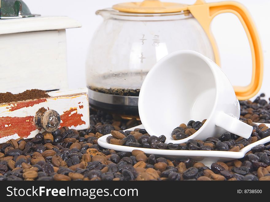 Cup of coffee over coffee grain