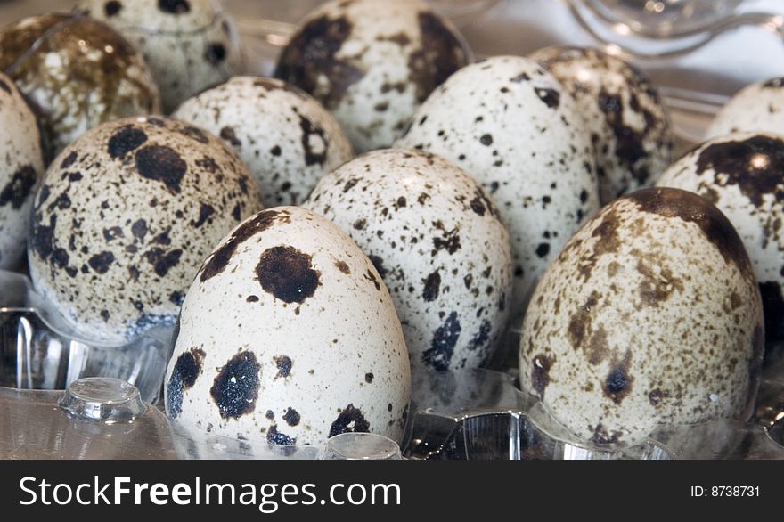 Blotched quail egg built neatly in tray. Blotched quail egg built neatly in tray