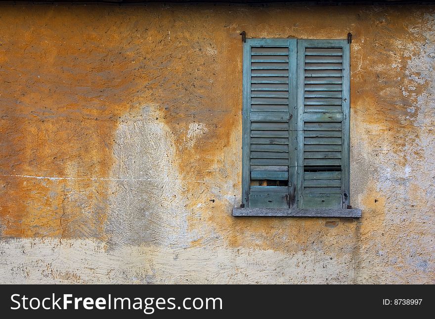 Old dilapidated building in the window