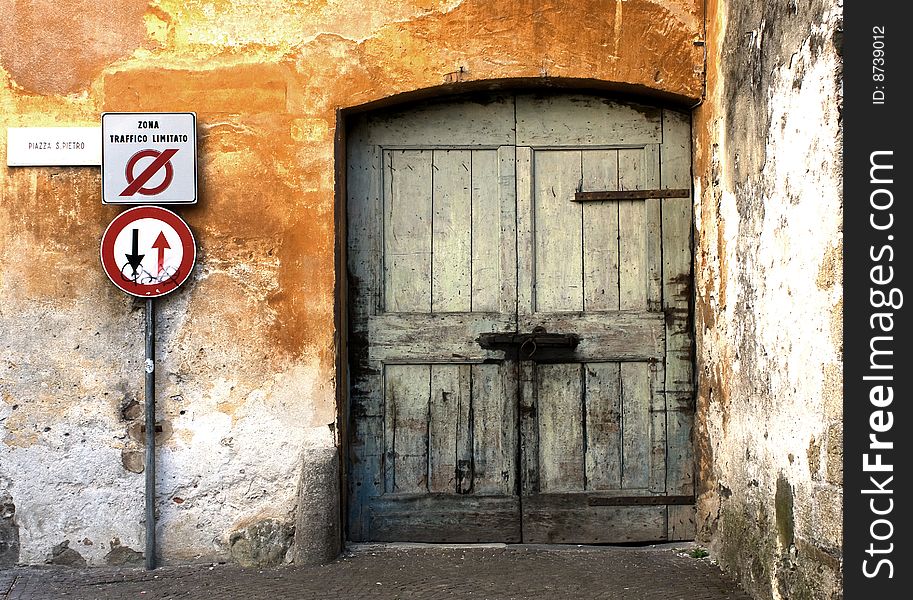 Entrance gate and road signs. Entrance gate and road signs