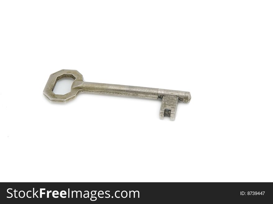 An old silver key isolated on white background