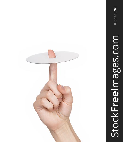 The female hand holds  a disk on a white background. The female hand holds  a disk on a white background