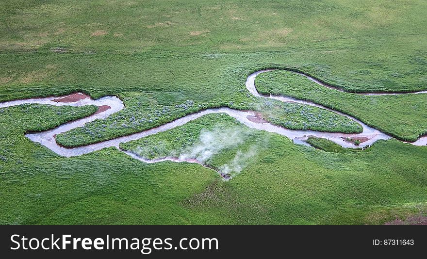 A hot spring discharges 77Â°C &#x28;~171Â°F&#x29; water into Hot Springs Creek, Akutan Island, Alaska, Akutan Volcano &#x28;photo&#x29;. Numerous industry-led geophysical studies and test drilling in the past few years have proven the existence of a geothermal resource. USGS field studies completed in 2012 suggest that the available geothermal resource may be even larger than previously recognized. The current heat output of the hot spring system is estimated at 29 megawatts â€“ nearly ten times higher than measured in the early 1980s. This large increase may reflect the volcanic and seismic events of the 1990s, and if so, it cannot be considered a short-term anomaly. Modern geothermal plants could use this heat to generate several MW of electricity. One MW of electric power would supply the needs of about 750 homes. You can read more details and find the full report at www.usgs.gov/newsroom/article.asp?ID=3776 Photo credit: Deborah Bergfeld, USGS. A hot spring discharges 77Â°C &#x28;~171Â°F&#x29; water into Hot Springs Creek, Akutan Island, Alaska, Akutan Volcano &#x28;photo&#x29;. Numerous industry-led geophysical studies and test drilling in the past few years have proven the existence of a geothermal resource. USGS field studies completed in 2012 suggest that the available geothermal resource may be even larger than previously recognized. The current heat output of the hot spring system is estimated at 29 megawatts â€“ nearly ten times higher than measured in the early 1980s. This large increase may reflect the volcanic and seismic events of the 1990s, and if so, it cannot be considered a short-term anomaly. Modern geothermal plants could use this heat to generate several MW of electricity. One MW of electric power would supply the needs of about 750 homes. You can read more details and find the full report at www.usgs.gov/newsroom/article.asp?ID=3776 Photo credit: Deborah Bergfeld, USGS.