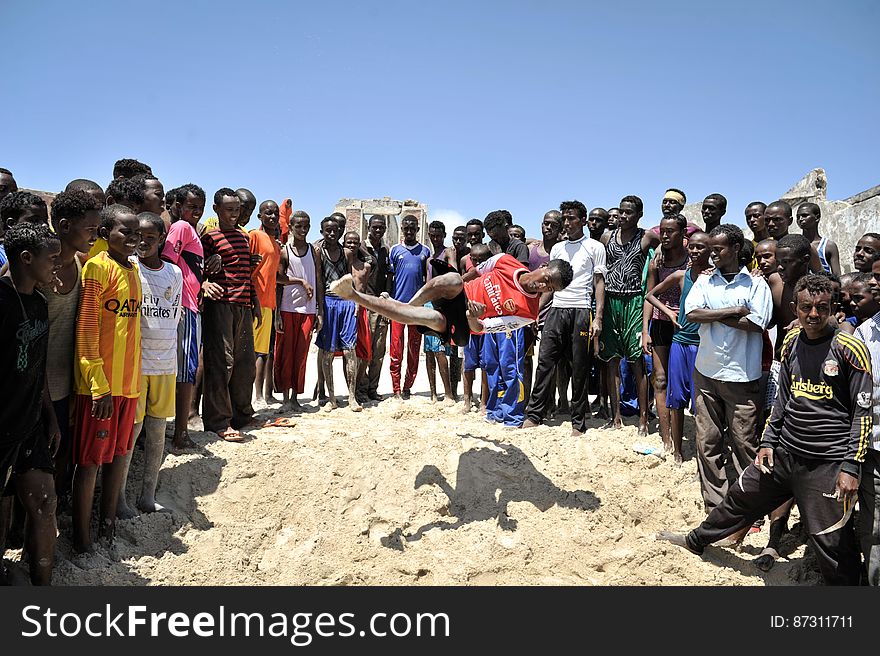 Boys practice their acrobatics on Lido beach in Mogadishu, Somalia, on January 31. The Mogadishu lifeguards, consisting entirely of a volunteer force of fisherman, began patrolling Lido beach in September 2013 after a spate of drownings. Mogadishu&#x27;s beaches have become a popular destination for the city&#x27;s residents since al Shabab withdrew the majority of its militants from the city in 2011. AU UN IST PHOTO / Tobin Jones. Boys practice their acrobatics on Lido beach in Mogadishu, Somalia, on January 31. The Mogadishu lifeguards, consisting entirely of a volunteer force of fisherman, began patrolling Lido beach in September 2013 after a spate of drownings. Mogadishu&#x27;s beaches have become a popular destination for the city&#x27;s residents since al Shabab withdrew the majority of its militants from the city in 2011. AU UN IST PHOTO / Tobin Jones