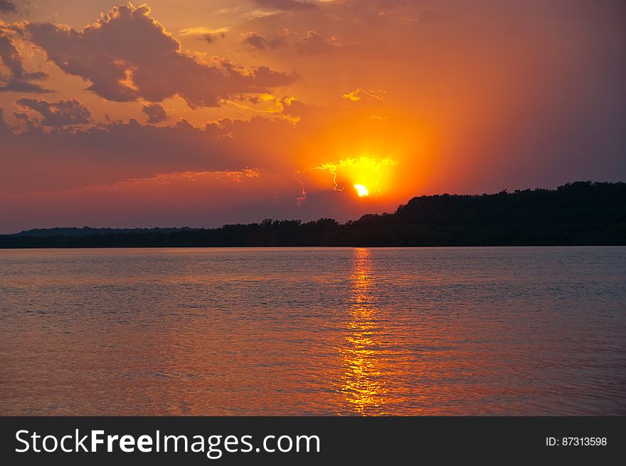 Sunset over Lake Oologah, Oklahoma, at the Blue Creek Campground where we spent the night. Read about our 2009 Summer Road Trip and view the entire photo collection on my blog. Sunset over Lake Oologah, Oklahoma, at the Blue Creek Campground where we spent the night. Read about our 2009 Summer Road Trip and view the entire photo collection on my blog.