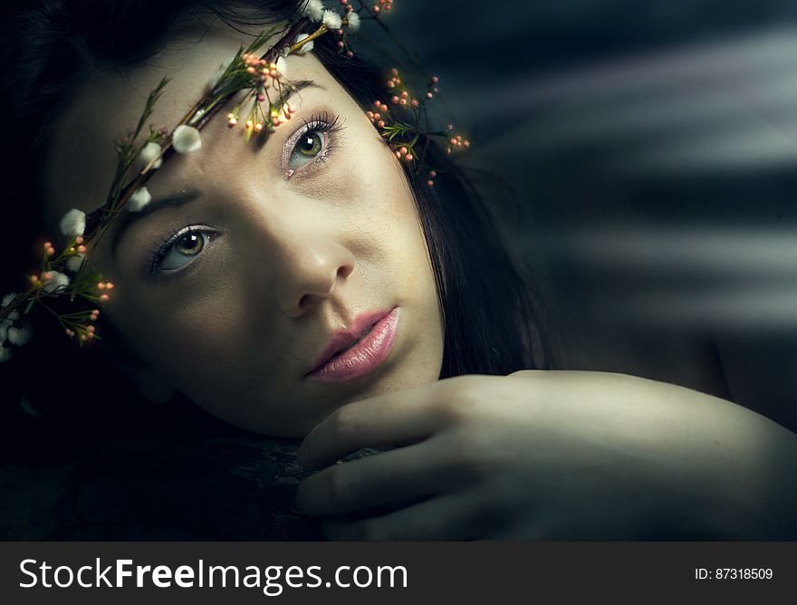 Beautiful woman with flowers in hair