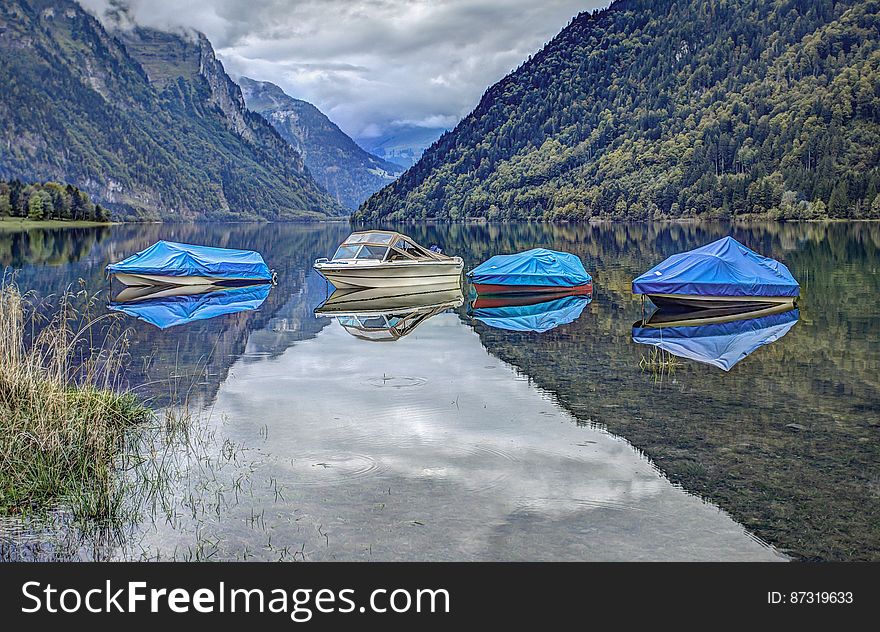 Covered Boats On Lake