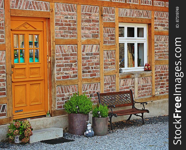 Detail Of House Built Of Wood And Brick