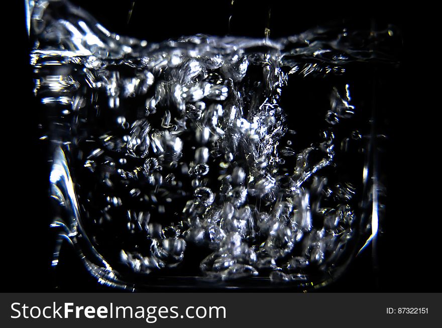 Close-up Of Water Splashing Against Black Background