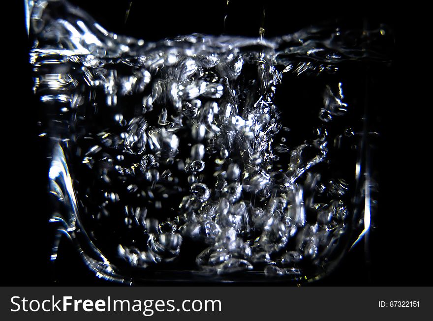 Close-up of Water Splashing Against Black Background