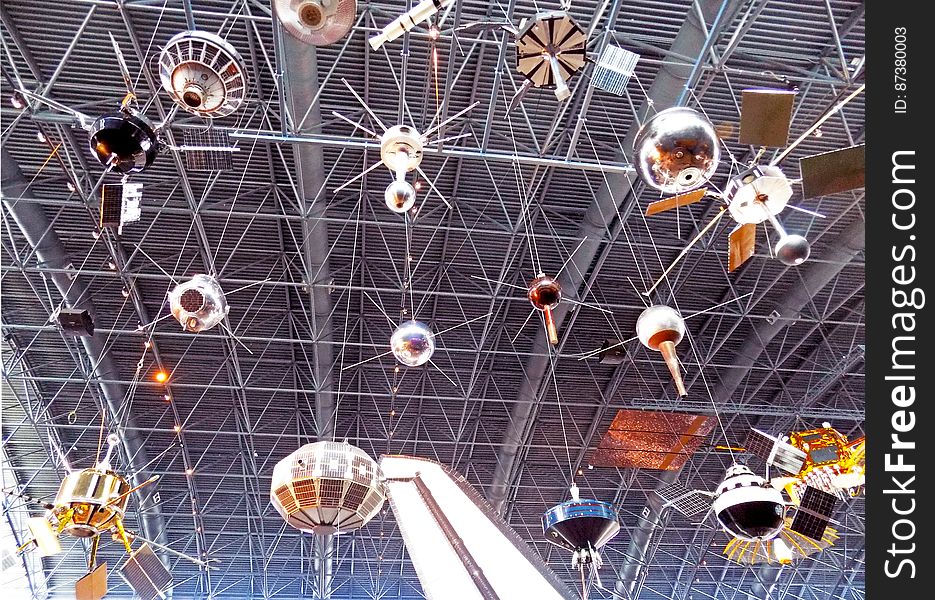 Satellites hanging in a hangar. Satellites hanging in a hangar.