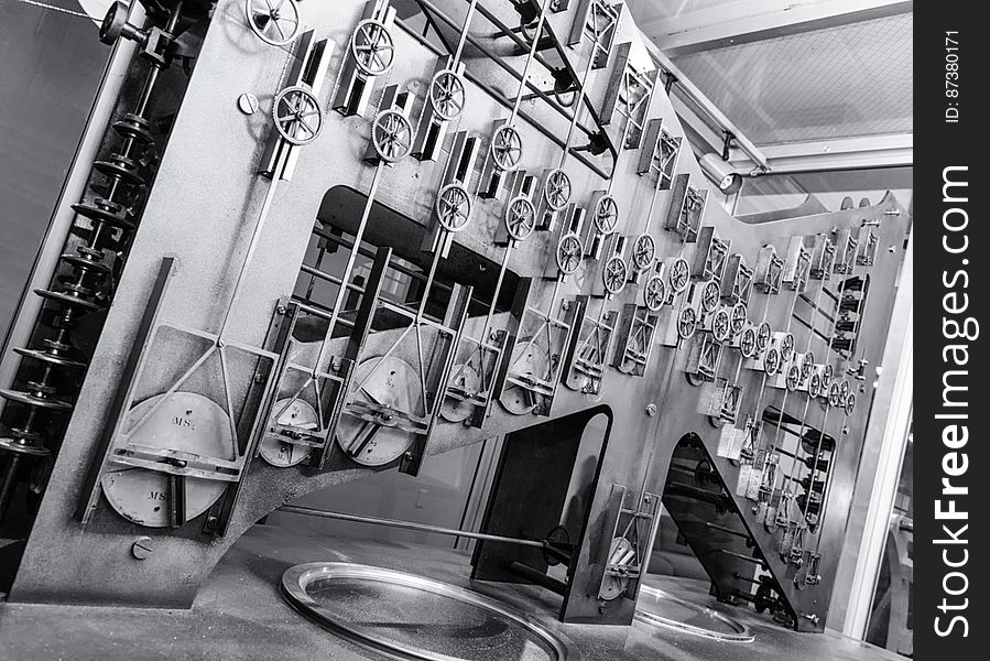 This photo shows the largest of the three sections of Tide Predicting Machine No. 2, a special purpose mechanical analog computer for predicting the height and time of high and low tides. The gears on the left transmit power from the hand crank. The components on the right contribute to the computation of the time of high and low tides. The U.S. government used Tide Predicting Machine No. 2 from 1910 to 1965 to produce its tide predictions. The machine, also known as â€œOld Brass Brains,â€ uses an intricate arrangement of gears, pulleys, chains, slides, and other mechanical components to perform the computations. A person using the machine would require 2-3 days to compute a yearâ€™s tides at one location. A person performing the same calculations by hand would require hundreds of days to perform the work. The machine is 10.8 feet &#x28;3.3 m&#x29; long, 6.2 feet &#x28;1.9 m&#x29; high, and 2.0 feet &#x28;0.61 m&#x29; wide and weighs approximately 2,500 pounds &#x28;1134 kg&#x29;. The operator powers the machine with a hand crank. The National Oceanic and Atmospheric Administration &#x28;NOAA&#x29; occasionally displays the machine at its facility in Silver Spring, Maryland. This photo shows the largest of the three sections of Tide Predicting Machine No. 2, a special purpose mechanical analog computer for predicting the height and time of high and low tides. The gears on the left transmit power from the hand crank. The components on the right contribute to the computation of the time of high and low tides. The U.S. government used Tide Predicting Machine No. 2 from 1910 to 1965 to produce its tide predictions. The machine, also known as â€œOld Brass Brains,â€ uses an intricate arrangement of gears, pulleys, chains, slides, and other mechanical components to perform the computations. A person using the machine would require 2-3 days to compute a yearâ€™s tides at one location. A person performing the same calculations by hand would require hundreds of days to perform the work. The machine is 10.8 feet &#x28;3.3 m&#x29; long, 6.2 feet &#x28;1.9 m&#x29; high, and 2.0 feet &#x28;0.61 m&#x29; wide and weighs approximately 2,500 pounds &#x28;1134 kg&#x29;. The operator powers the machine with a hand crank. The National Oceanic and Atmospheric Administration &#x28;NOAA&#x29; occasionally displays the machine at its facility in Silver Spring, Maryland.