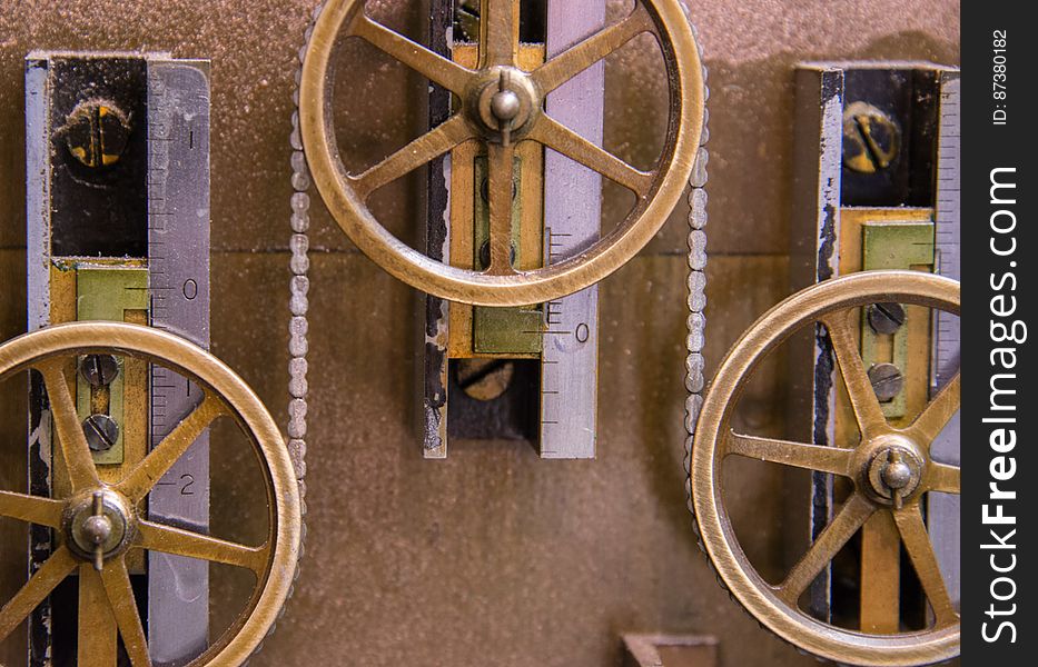 A part of the summation chain of Tide Predicting Machine No. 2, a special purpose mechanical analog computer for predicting the height and time of high and low tides. By wrapping above and below a series of pulleys, the chain sums their deflections, which is a key component of computing tides. The U.S. government used Tide Predicting Machine No. 2 from 1910 to 1965 to predict tides for ports around the world. The machine, also known as â€œOld Brass Brains,â€ uses an intricate arrangement of gears, pulleys, chains, slides, and other mechanical components to perform the computations. A person using the machine would require 2-3 days to compute a yearâ€™s tides at one location. A person performing the same calculations by hand would require hundreds of days to perform the work. The machine is 10.8 feet &#x28;3.3 m&#x29; long, 6.2 feet &#x28;1.9 m&#x29; high, and 2.0 feet &#x28;0.61 m&#x29; wide and weighs approximately 2,500 pounds &#x28;1134 kg&#x29;. The operator powers the machine with a hand crank. A part of the summation chain of Tide Predicting Machine No. 2, a special purpose mechanical analog computer for predicting the height and time of high and low tides. By wrapping above and below a series of pulleys, the chain sums their deflections, which is a key component of computing tides. The U.S. government used Tide Predicting Machine No. 2 from 1910 to 1965 to predict tides for ports around the world. The machine, also known as â€œOld Brass Brains,â€ uses an intricate arrangement of gears, pulleys, chains, slides, and other mechanical components to perform the computations. A person using the machine would require 2-3 days to compute a yearâ€™s tides at one location. A person performing the same calculations by hand would require hundreds of days to perform the work. The machine is 10.8 feet &#x28;3.3 m&#x29; long, 6.2 feet &#x28;1.9 m&#x29; high, and 2.0 feet &#x28;0.61 m&#x29; wide and weighs approximately 2,500 pounds &#x28;1134 kg&#x29;. The operator powers the machine with a hand crank.