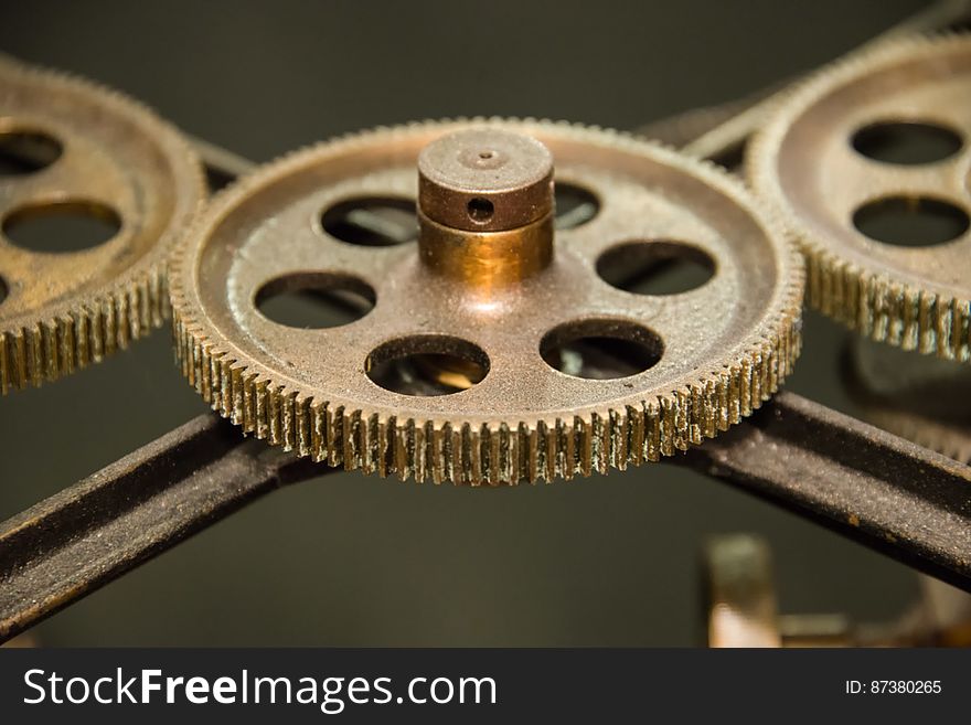 These gears pass some the energy provided by the operator turning a crank to the rear section of Tide Predicting Machine No. 2, a special purpose mechanical analog computer for predicting the height and time of high and low tides. The U.S. government used Tide Predicting Machine No. 2 from 1910 to 1965 to predict tides for ports around the world. The machine, also known as â€œOld Brass Brains,â€ uses an intricate arrangement of gears, pulleys, chains, slides, and other mechanical components to perform the computations. A person using the machine would require 2-3 days to compute a yearâ€™s tides at one location. A person performing the same calculations by hand would require hundreds of days to perform the work. The machine is 10.8 feet &#x28;3.3 m&#x29; long, 6.2 feet &#x28;1.9 m&#x29; high, and 2.0 feet &#x28;0.61 m&#x29; wide and weighs approximately 2,500 pounds &#x28;1134 kg&#x29;. The operator powers the machine with a hand crank. These gears pass some the energy provided by the operator turning a crank to the rear section of Tide Predicting Machine No. 2, a special purpose mechanical analog computer for predicting the height and time of high and low tides. The U.S. government used Tide Predicting Machine No. 2 from 1910 to 1965 to predict tides for ports around the world. The machine, also known as â€œOld Brass Brains,â€ uses an intricate arrangement of gears, pulleys, chains, slides, and other mechanical components to perform the computations. A person using the machine would require 2-3 days to compute a yearâ€™s tides at one location. A person performing the same calculations by hand would require hundreds of days to perform the work. The machine is 10.8 feet &#x28;3.3 m&#x29; long, 6.2 feet &#x28;1.9 m&#x29; high, and 2.0 feet &#x28;0.61 m&#x29; wide and weighs approximately 2,500 pounds &#x28;1134 kg&#x29;. The operator powers the machine with a hand crank.