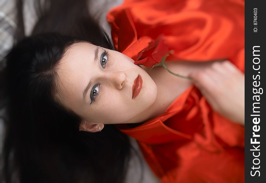 Portrait of the beautiful sexual girl in red. Portrait of the beautiful sexual girl in red