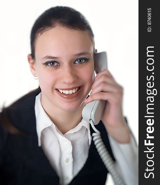 Attractive young woman calling by phone. Attractive young woman calling by phone