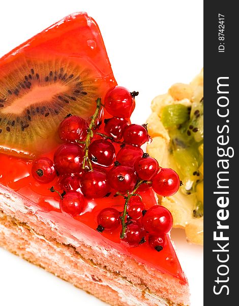 Celebratory cake with currant on a white background