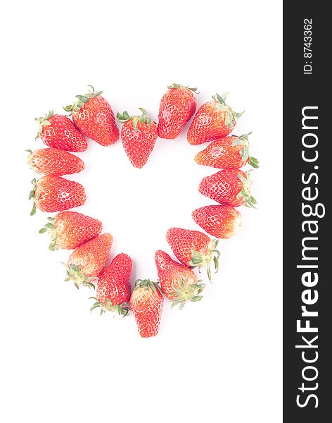 Fresh juicy strawberry isolated on white with heart shape