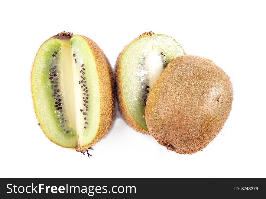 Sliced ripe fresh kiwi isolated on white. Sliced ripe fresh kiwi isolated on white