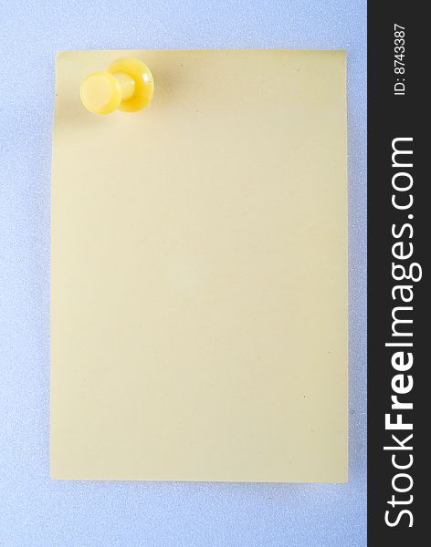 Yellow post it note with color pin isolated. Yellow post it note with color pin isolated