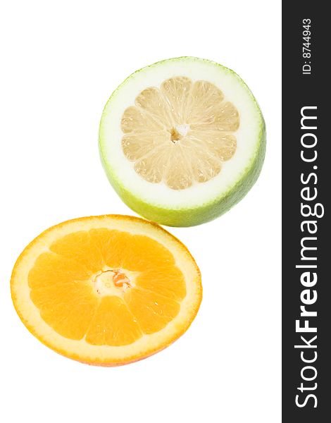 Freshly Sliced orange and lime on an isolated background. Freshly Sliced orange and lime on an isolated background