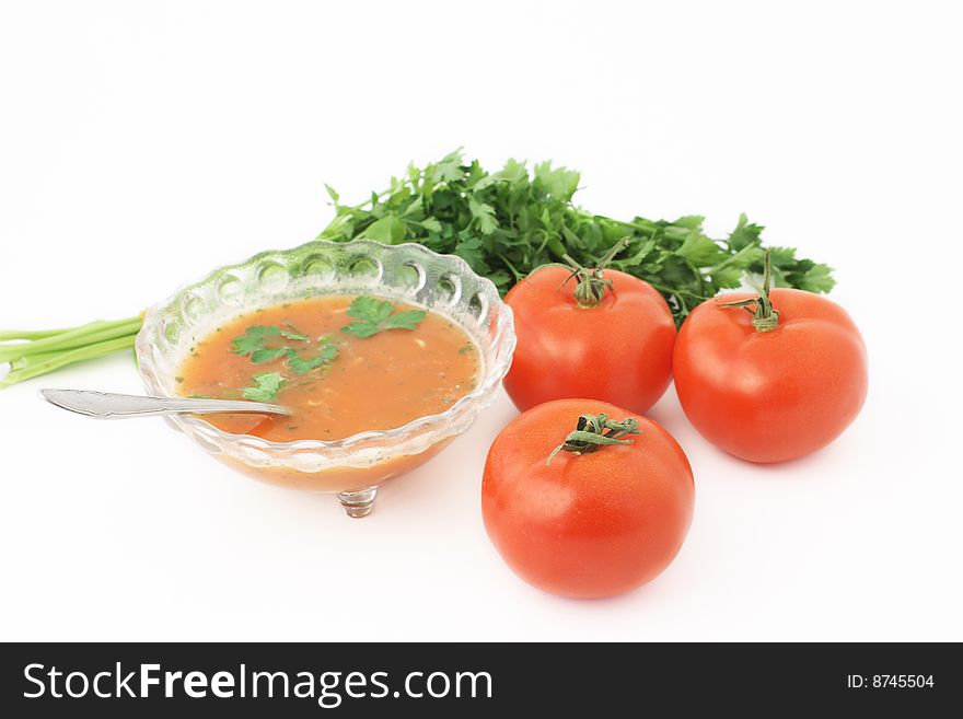 Delicious soup with parsley and tomatoes
