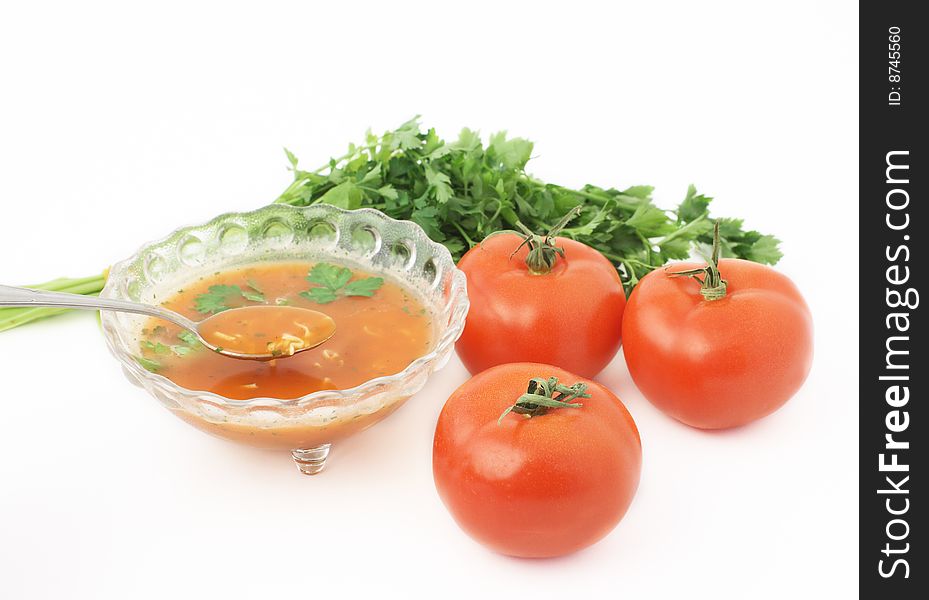 Soup with tomatoes and parsley