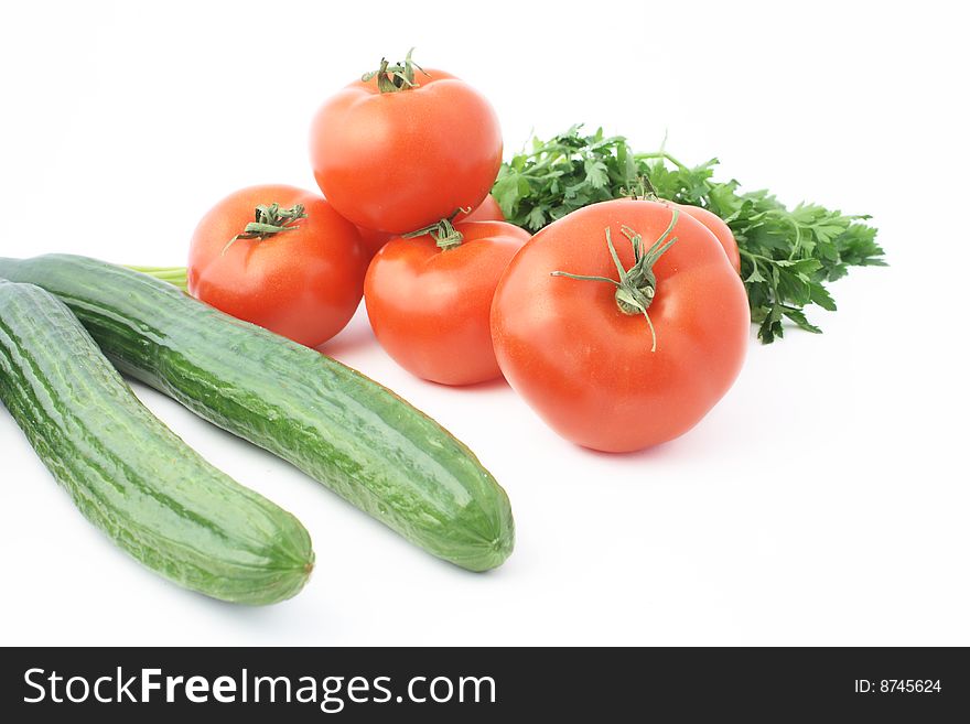 Two cucumbers with tomatoes and parsley