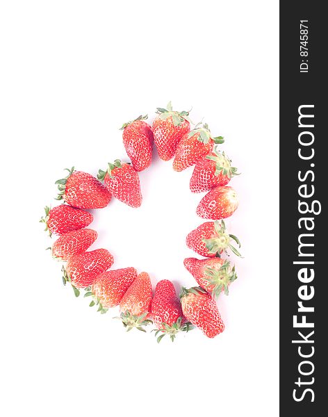 Fresh juicy strawberry isolated on white with heart shape
