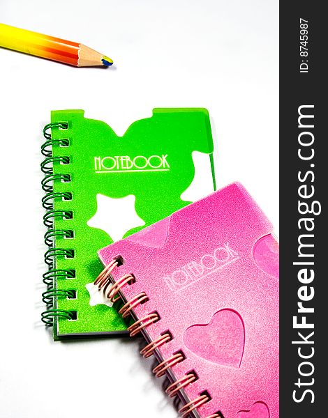 Notebook and pencil with white background. Notebook and pencil with white background
