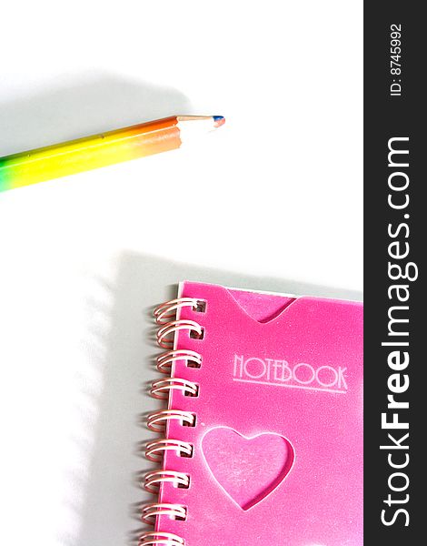 Notebook and pencil with white background. Notebook and pencil with white background